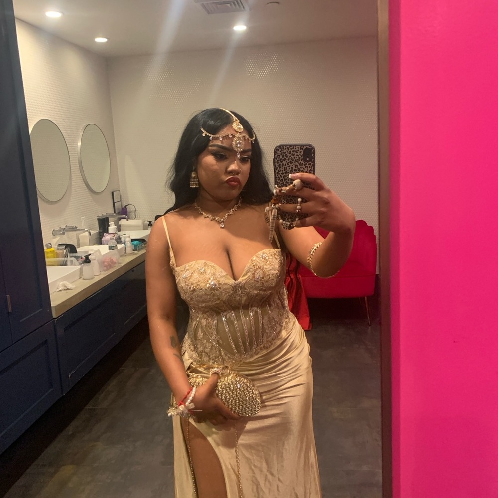 Glamorous Gold Prom Dress with Intricate Detailing
